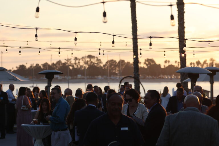 sunset silhouette of gala guests