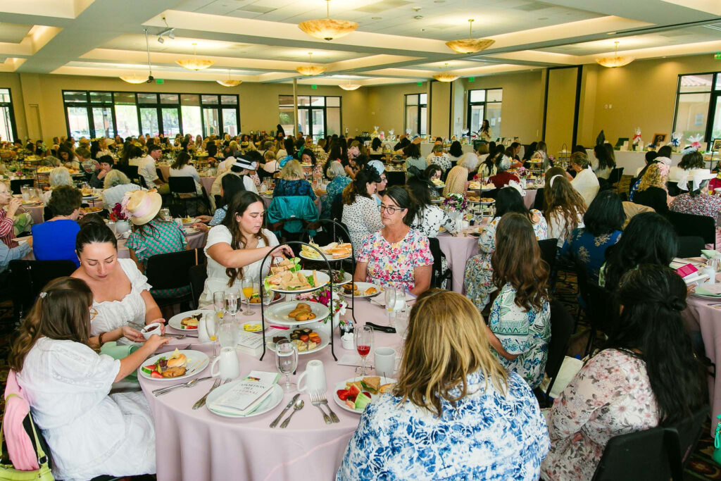 Tea 2026 guests gathered at tables